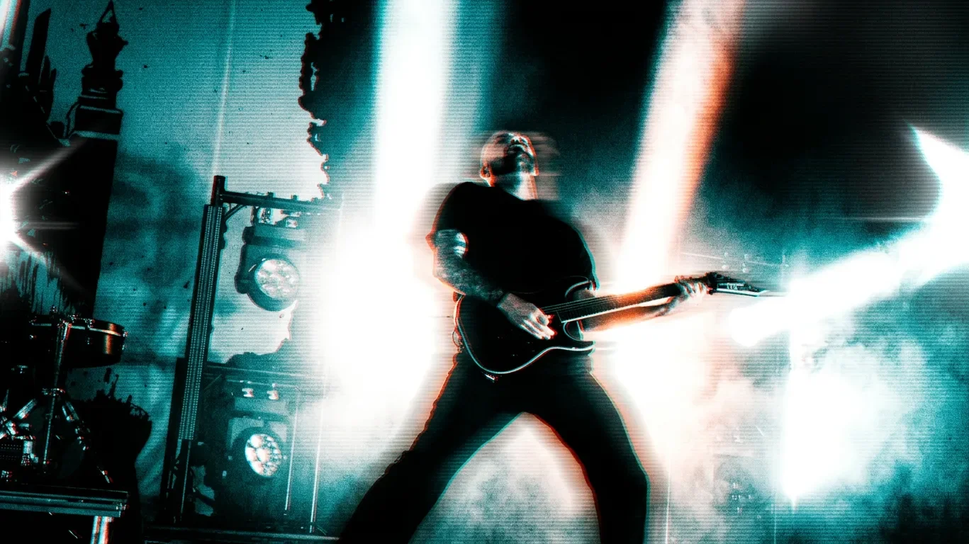 The Lonely God printed backdrop illuminated in red as Fit For A King close their set at the Commodore Ballroom