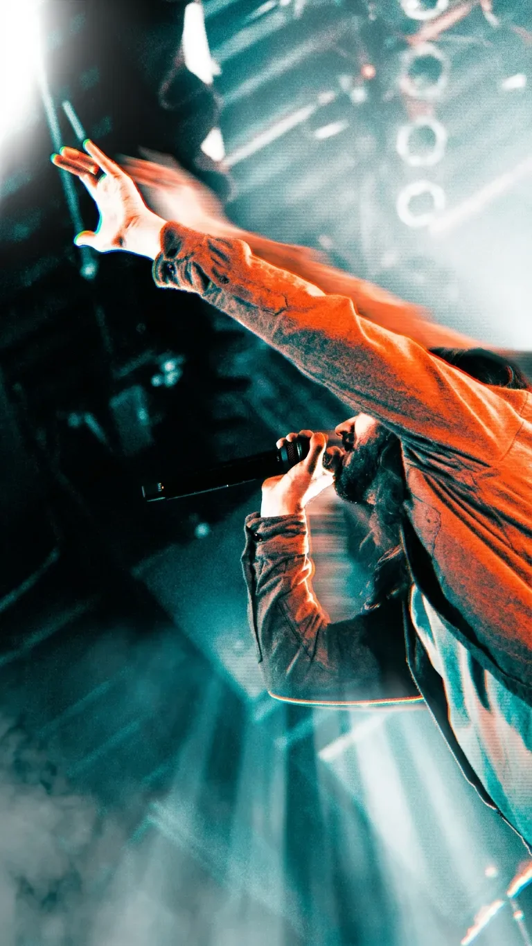 Fit For A King frontman Ryan Kirby commanding the Commodore Ballroom stage during the opening of the set